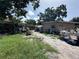 Expansive backyard offering potential for landscaping, gardening, and outdoor activities at 6817 S Wall St, Tampa, FL 33616