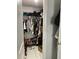 Walk-in closet with organized clothing racks and shoe storage, offering ample space at 7022 Hubert, Tampa, FL 33614