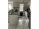 Well-equipped kitchen features sleek countertops, stainless steel appliances, and abundant cabinet space at 7022 Hubert, Tampa, FL 33614