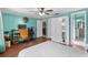 This spacious bedroom is bright and airy with an attached wardrobe at 7040 Fox Hollow Dr, Port Richey, FL 34668