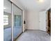 Enclosed patio with sliding glass doors to the outside at 7040 Fox Hollow Dr, Port Richey, FL 34668