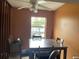 Dining room with a fan and a dining table set below a window at 7192 E Bank Dr, Tampa, FL 33617