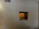 Interior wall with a pass-through opening, neutral paint, and a light switch at 7192 E Bank Dr, Tampa, FL 33617