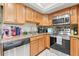 Kitchen featuring stainless steel appliances and granite countertops at 7614 Radcliffe Cir # 202B, Port Richey, FL 34668