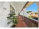 Open-air walkway offers stunning views of the community and beautiful landscaping in a tranquil setting at 7614 Radcliffe Cir # 202B, Port Richey, FL 34668