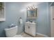 Charming bathroom features a vanity, mirror, and neutral tile at 811 W Peninsular St, Tampa, FL 33603