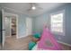 Bright bedroom showing the closet with unique wall shelves at 811 W Peninsular St, Tampa, FL 33603