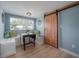 Cozy dining area features bench seating, a small table, and a sliding barn door at 811 W Peninsular St, Tampa, FL 33603