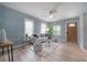 Comfortable living room features bright walls, wood floors, and modern furnishings with great natural light at 811 W Peninsular St, Tampa, FL 33603