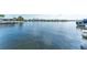 Expansive water view showcasing the calm waters and picturesque waterfront homes in a beautiful community at 835 Symphony Isles Blvd, Apollo Beach, FL 33572