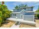 Two-story home with a spacious deck, perfect for entertaining or relaxing in the backyard at 842 S Boulevard, Tampa, FL 33606