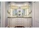 Luxurious bathroom features double sinks with marble countertops and custom cabinetry at 842 S Boulevard, Tampa, FL 33606