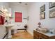 Classic bathroom features a vintage sink, decorative accents, and stylish red window covering at 842 S Boulevard, Tampa, FL 33606