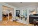 Living room with hardwood floors that opens up to the dining room space at 842 S Boulevard, Tampa, FL 33606