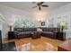 Inviting living room with large windows, hardwood floors, and comfortable seating area at 842 S Boulevard, Tampa, FL 33606