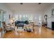 Bright living room with hardwood floors, fireplace, and plenty of natural light at 842 S Boulevard, Tampa, FL 33606