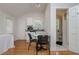 Bright studio apartment with hardwood floors, a compact kitchen, and an adjacent bathroom at 842 S Boulevard, Tampa, FL 33606