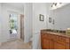 Bathroom with granite countertops and walk out access at 8476 Dunham Station Dr, Tampa, FL 33647