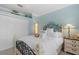 Light and bright bedroom with a coastal aesthetic at 8476 Dunham Station Dr, Tampa, FL 33647