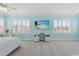 Spacious bedroom with two large windows and a built in desk at 8476 Dunham Station Dr, Tampa, FL 33647