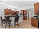 Gourmet kitchen with granite countertops, stainless steel appliances, and custom cabinetry at 8476 Dunham Station Dr, Tampa, FL 33647