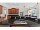Gourmet kitchen with granite countertops, stainless steel appliances, and custom cabinetry at 8476 Dunham Station Dr, Tampa, FL 33647