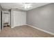 This bedroom has a ceiling fan and a closet at 8635 Chadwick Dr, Tampa, FL 33635