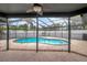 This beautiful backyard has a screened-in pool at 8635 Chadwick Dr, Tampa, FL 33635