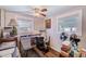 Bedroom with hardwood floors, natural light, and a ceiling fan at 10436 117Th Dr, Largo, FL 33773