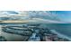 Wonderful aerial view of a coastal city with a beach and waterfront homes at 100 Bayside Dr # 202, Clearwater Beach, FL 33767