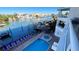 Aerial view of waterfront property, showing boat docks, pool, and canal access at 100 Bayside Dr # 202, Clearwater Beach, FL 33767