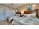 Comfortable bedroom with two twin beds and beach themed accents at 100 Bayside Dr # 202, Clearwater Beach, FL 33767