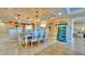 Stylish dining room with a decorative chandelier at 100 Bayside Dr # 202, Clearwater Beach, FL 33767