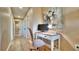 Hallway with office nook with white desk, chair and computer at 100 Bayside Dr # 202, Clearwater Beach, FL 33767