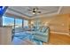 Beautifully furnished living room with natural light, comfortable seating, and stylish decor at 100 Bayside Dr # 202, Clearwater Beach, FL 33767