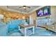 Cozy living room that opens to the kitchen at 100 Bayside Dr # 202, Clearwater Beach, FL 33767