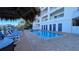 Exterior shot of pool and tanning deck on condo grounds at 100 Bayside Dr # 202, Clearwater Beach, FL 33767
