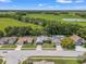 A high angle view shows the home in its neighborhood at 10032 Basin St, New Port Richey, FL 34655