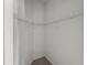 Functional walk-in closet with wire shelving, providing practical storage solutions at 10032 Basin St, New Port Richey, FL 34655