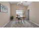Inviting home office with natural light, patterned rug, and neutral color scheme at 10032 Basin St, New Port Richey, FL 34655