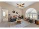 Comfortable living room featuring a large window, neutral colors, and modern furnishings at 10032 Basin St, New Port Richey, FL 34655
