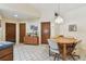 Bright dining area adjacent to the kitchen with tile floors and ample space for entertaining at 10265 130Th St, Largo, FL 33774