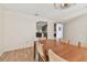 Dining room with wood floors and view into other rooms at 10265 130Th St, Largo, FL 33774