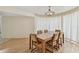 Dining area featuring wood floors, large window, and natural light at 10265 130Th St, Largo, FL 33774