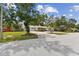 Well-maintained one-story home with a spacious driveway, and green lawn in a mature neighborhood at 10265 130Th St, Largo, FL 33774