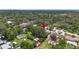 Aerial view showing the home's location within a lush, green residential area at 11001 Ridgedale Rd, Temple Terrace, FL 33617