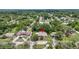 Aerial view showcasing property location within a vibrant, tree-filled neighborhood at 11001 Ridgedale Rd, Temple Terrace, FL 33617