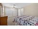 Bright bedroom with dual closets and a ceiling fan at 11001 Ridgedale Rd, Temple Terrace, FL 33617