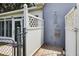Outdoor shower area with white lattice fencing, brick pavers and an integrated shower head at 11001 Ridgedale Rd, Temple Terrace, FL 33617