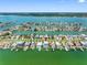 Stunning aerial view of waterfront homes with docks and boats in the Gulf Coast community at 11260 7Th E St, Treasure Island, FL 33706